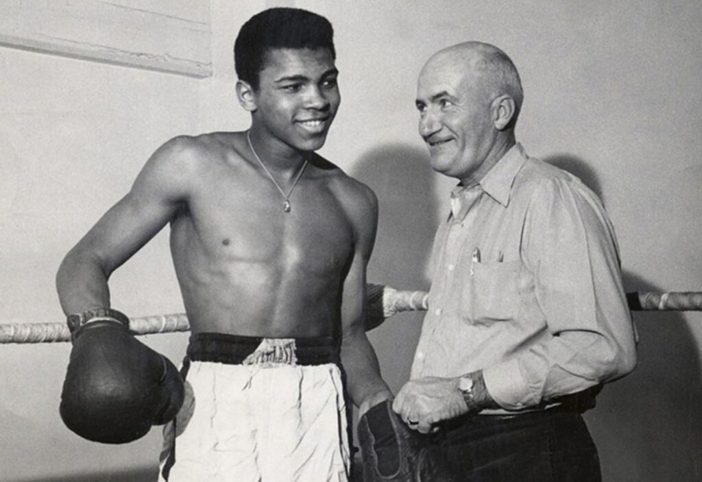 Muhammad Ali with his trainer