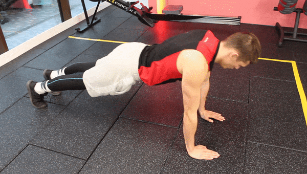 Mike performing the standard pushup and nailing the proper pushup form.