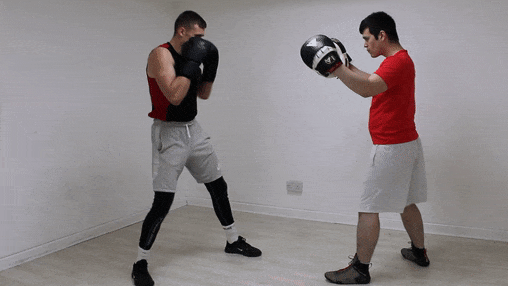 The left hook, right hook, left hook, and cross boxing combination