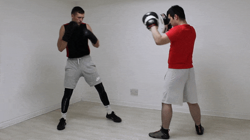 The cross Left hook boxing combination
