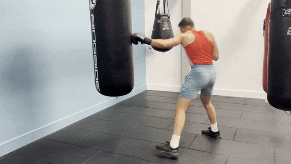 Demonstration of the punching bag workout's round 6 where you throw only power punches