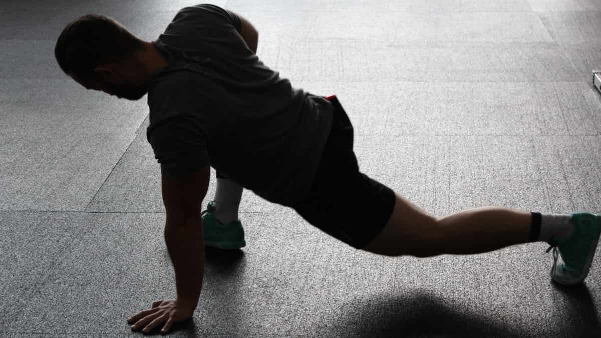 A man stretching.