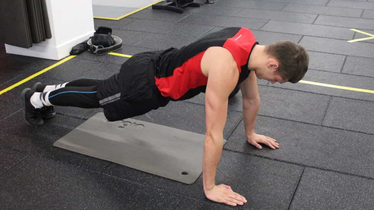 Mike in the plank position during a pushup.