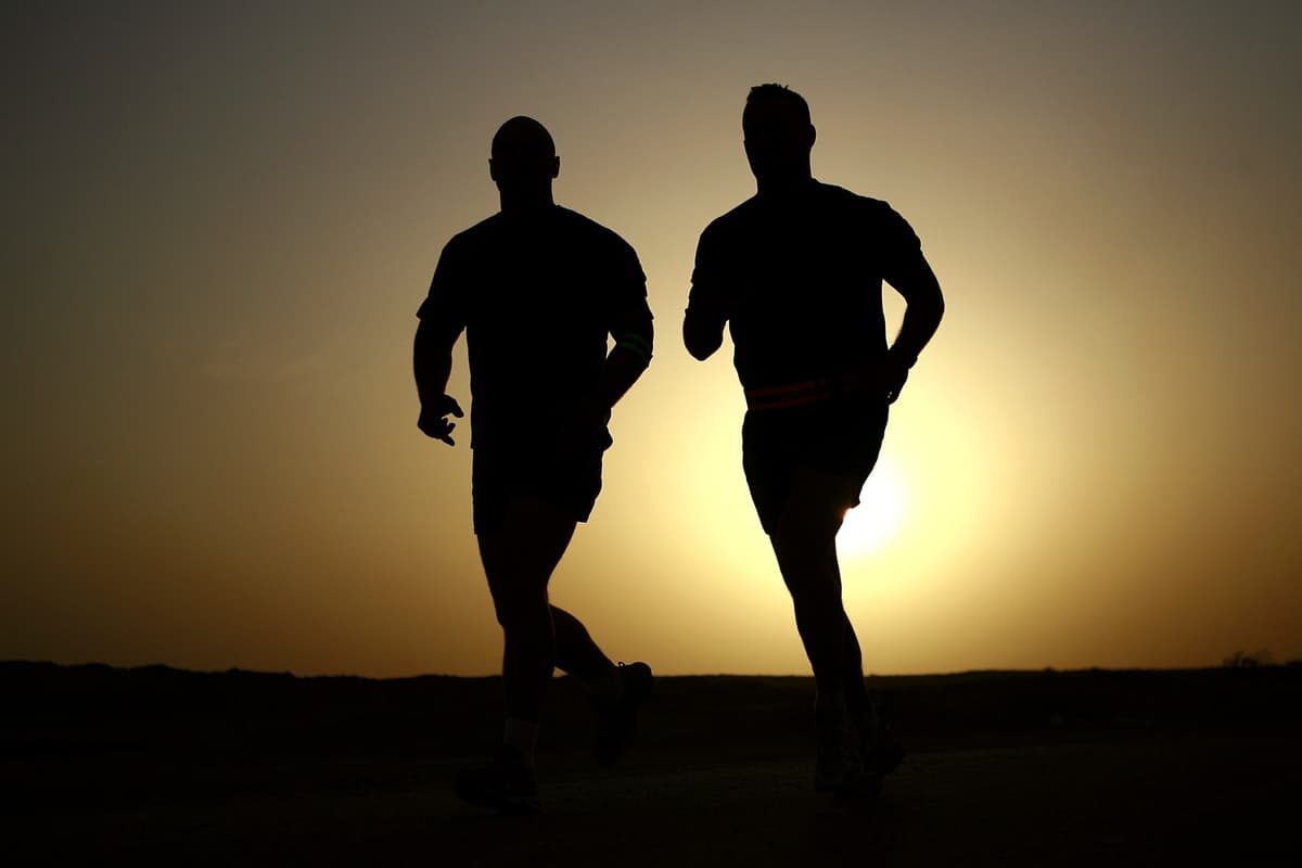 people-jogging Two joggers jogging at sunset.