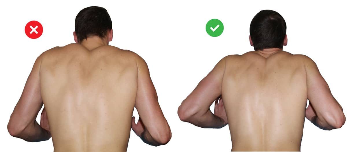 Proper pushup form: demonstration of the mistake in a side by side comparison of not squeezing the shoulders.